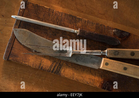 Old kitchen utensils on wood Stock Photo