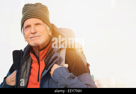 Senior man hiking Stock Photo