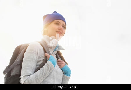 Portrait of female tourist with backpack Stock Photo
