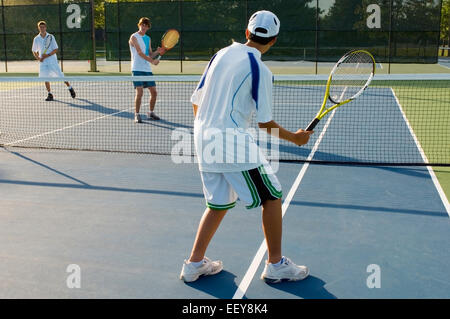 Group of tennis players on a court Stock Photo