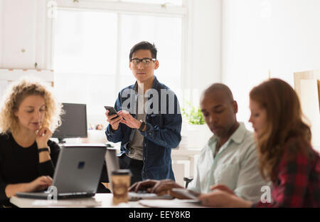 Portrait of businessman using cell phone Stock Photo