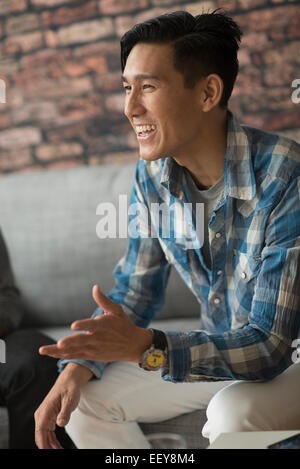 Cheerful man laughing Stock Photo