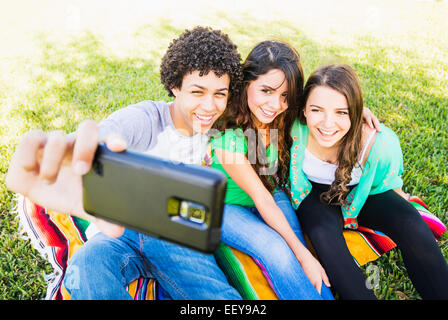 Group of friends (14-15) making selfie Stock Photo