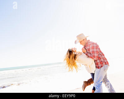 USA, Florida, Jupiter, Loving couple on beach Stock Photo