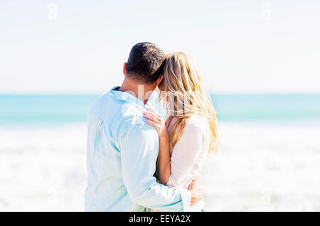 USA, Florida, Jupiter, Couple embracing on beach Stock Photo