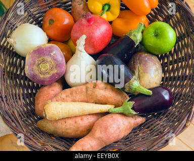 Mixed fruit and vegetables in a basket Stock Photo