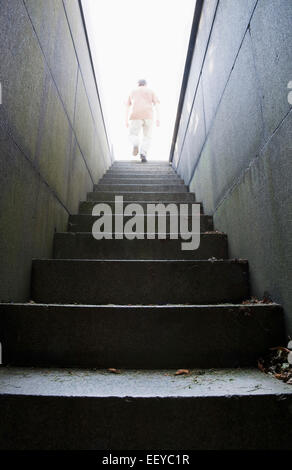 USA, Massachusetts, Boston, Man at top of stone stairway Stock Photo