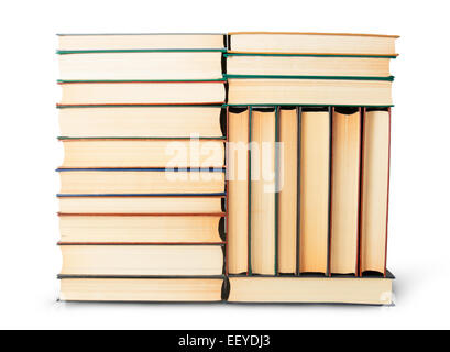 Different stack of old books isolated on white background Stock Photo
