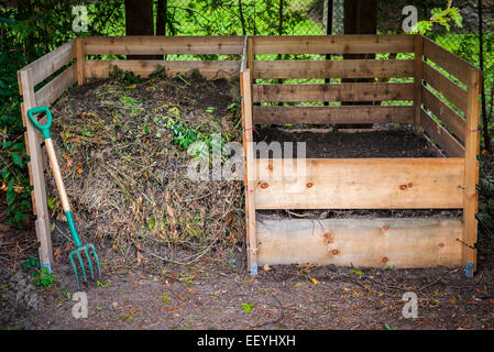 Large backyard wooden garden waste composting bin Stock Photo - Alamy