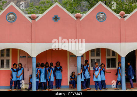 Female students are waiting for a daily briefing session after classes, at a free school and dormitory in Dungeshwari, Bihar, India. Stock Photo