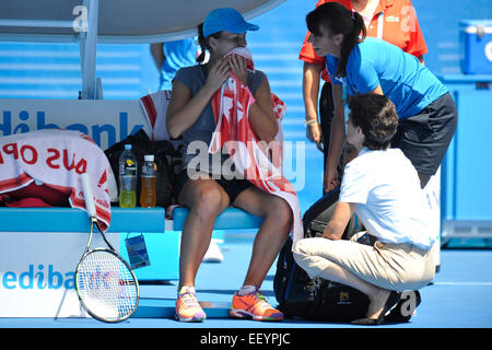 Melbourne, Australia. 24th January, 2015. Australian Open Tennis from Melbourne Park. Varvara Lepchenko of the USA rests from the heat and gets some medical attention during her match against Agnieszka Radwanska of Poland on day six of the 2015 Australian Credit:  Action Plus Sports Images/Alamy Live News Stock Photo