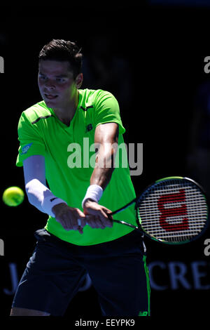 Melbourne, Australia. 24th January, 2015. Australian Open Tennis from Melbourne Park. Milos Raonic of Canada returns a shot in his match against Benjamin Becker of Germany on day six of the 2015 Australian Open at Melbourne Park, Melbourne, Australia. Credit:  Action Plus Sports Images/Alamy Live News Stock Photo