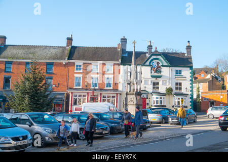 Ashbourne, a market town in Derbyshire,England family walking through town centre Stock Photo