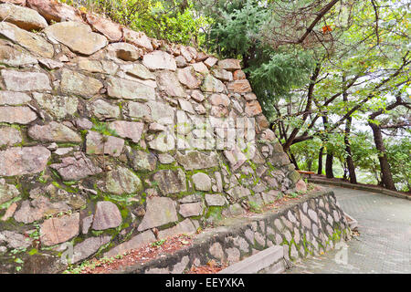 Stone walls, the only survived structure of Busan castle in Busan town (Republic of Korea) Stock Photo