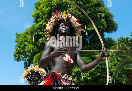 A tribal dancer  with black smeared face, Ati Atihan Festival, Kalibo, Aklan, Western Visayas Region, Panay Island, Philippines. Stock Photo