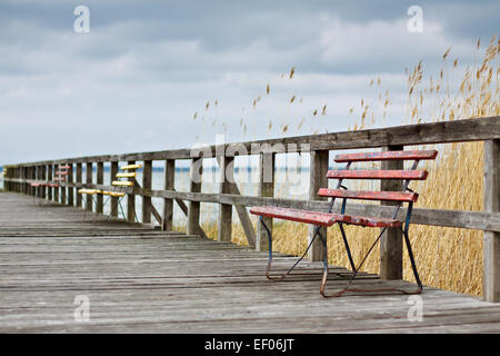 Benches on a pier. Stock Photo