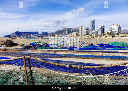 Calpe, Spain, fishing nets drying in the sun at the fishing port Stock Photo