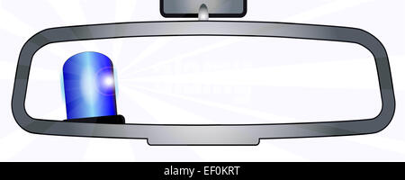 A vehicle rear view mirror showing a police vehicle flashing blue light Stock Photo
