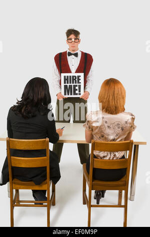 Geeky looking man at a business interview Stock Photo