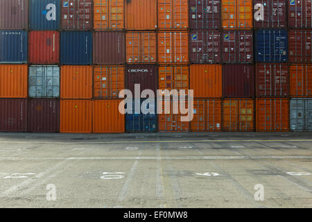 Container Brand/color Various brands and colors of shipping containers stacked Stock Photo ...