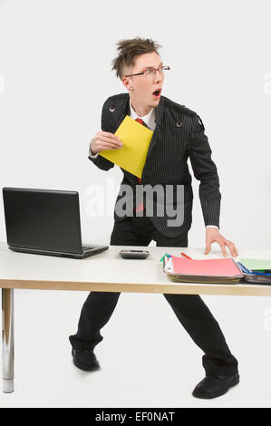 Man stealing a file folder Stock Photo