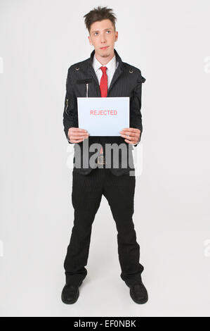 Man holding a rejected sign Stock Photo