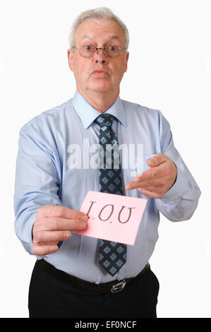 Businessman holding I.O.U sign Stock Photo