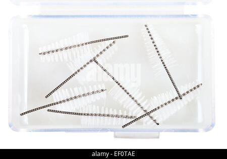Interdental Brush Refills in plastic box isolated on white background Stock Photo