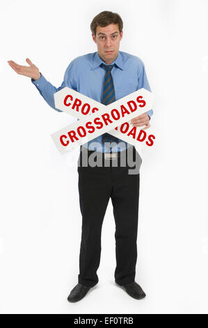 Businessman at a crossroads