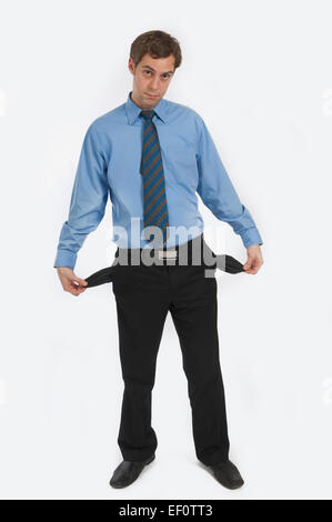 Businessman turning his pockets inside out
