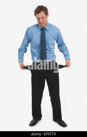 Businessman turning his pockets inside out
