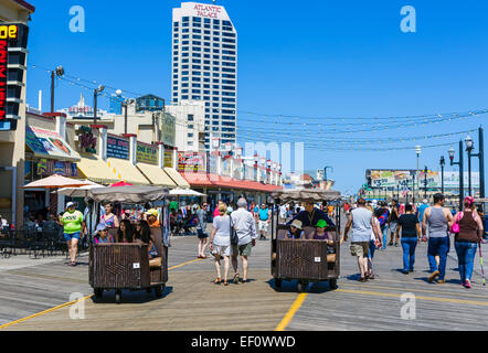 Famous Rolling Chairs on the boardwalk in Atlantic City, New Jersey, USA Stock Photo