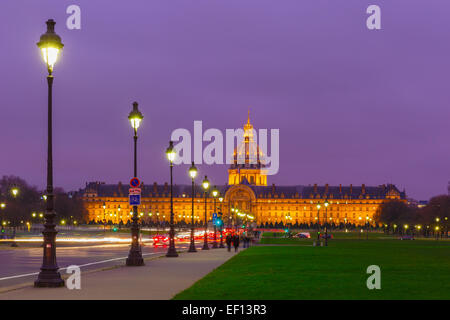 Les Invalides at night illumination in Paris, France Stock Photo