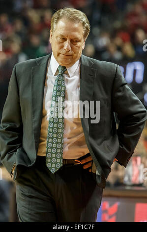 Nebraska head basketball coach Tom Miles responds to a question during ...