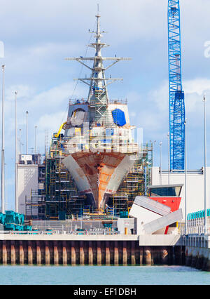 Destroyer under construction in a naval shipyard Stock Photo