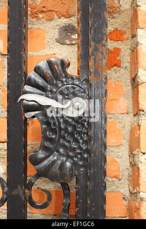 old metal door finger on ancient gateway, detail Stock Photo