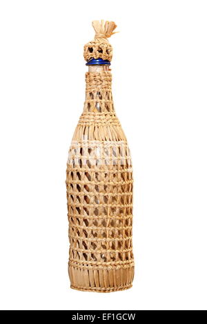 traditional vine bottle covered in wattle  isolated over white background Stock Photo