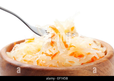 cabbage salad in wooden bowl and fork Stock Photo