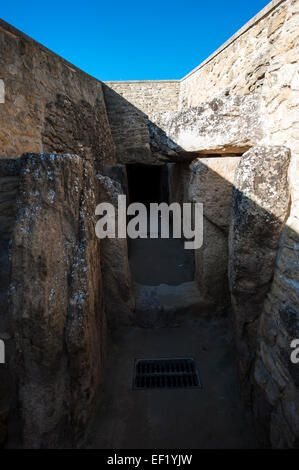Entrance to the Dolmen de Viera,  a megalithic burial mound located near Antequera, Málaga, Spain. Stock Photo