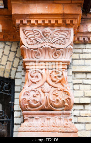 Detail of an old pillar on facade Stock Photo