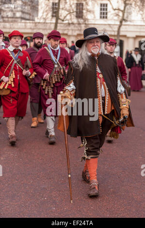 London, UK. 25th January, 2015.  Members of The English Civil War Society, one of the oldest re-enactment groups in the world, bring to life The King´s Army (the Royalist half of the English Civil War Society) as they retrace the route taken by King Charles I from St James Palace to the place of his execution at the Banqueting House in Whitehall.  Credit:  Stephen Chung/Alamy Live News Stock Photo