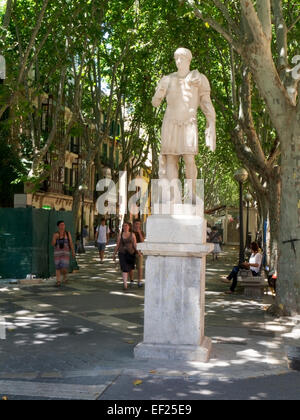 At the top of the Ramblas in the old town of Palma in Mallorca are  two copied statues of Roman warriors. Stock Photo