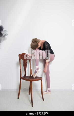 girl dancer before Training. Choose Your clothes. Stock Photo