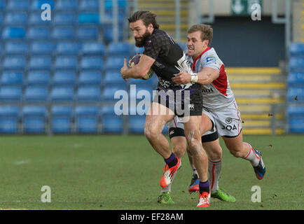 Oxford, UK. 25th January, 2015. European Rugby Champions Cup. London Welsh versus Lyon Olympique. Seb Stegmann is caught in midfield by Didier Tison. Credit:  Action Plus Sports Images/Alamy Live News Stock Photo