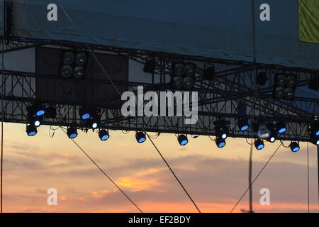 multiple spotlights on a theatre stage lighting rig for consert Stock Photo