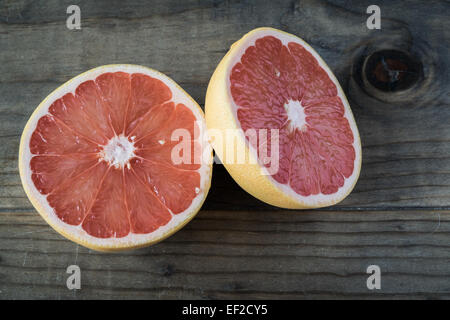Sliced grapefruit on Wooden table Stock Photo