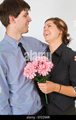 Couple standing together Stock Photo