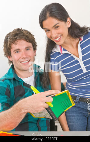 Two students in a classroom Stock Photo