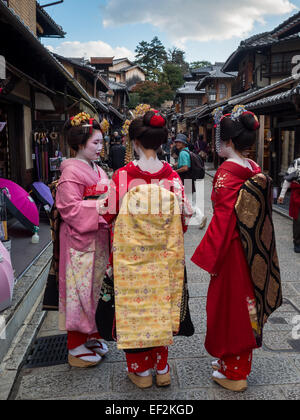 Women dressed as Geisha in old Kyoto street Stock Photo