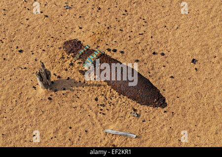 Rally-raid Baha 'Belarus' 2014. Rusty artillery shell on the old former military ground. Stock Photo